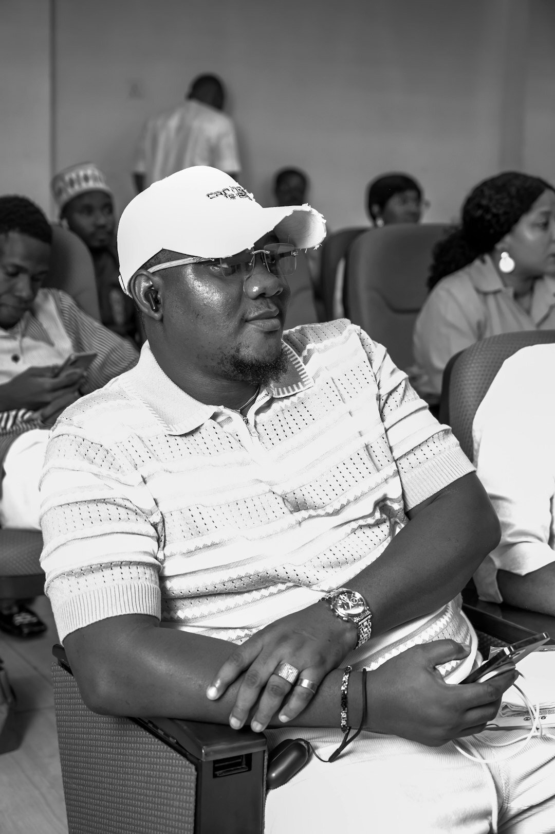 Seated audience listening attentively during a session