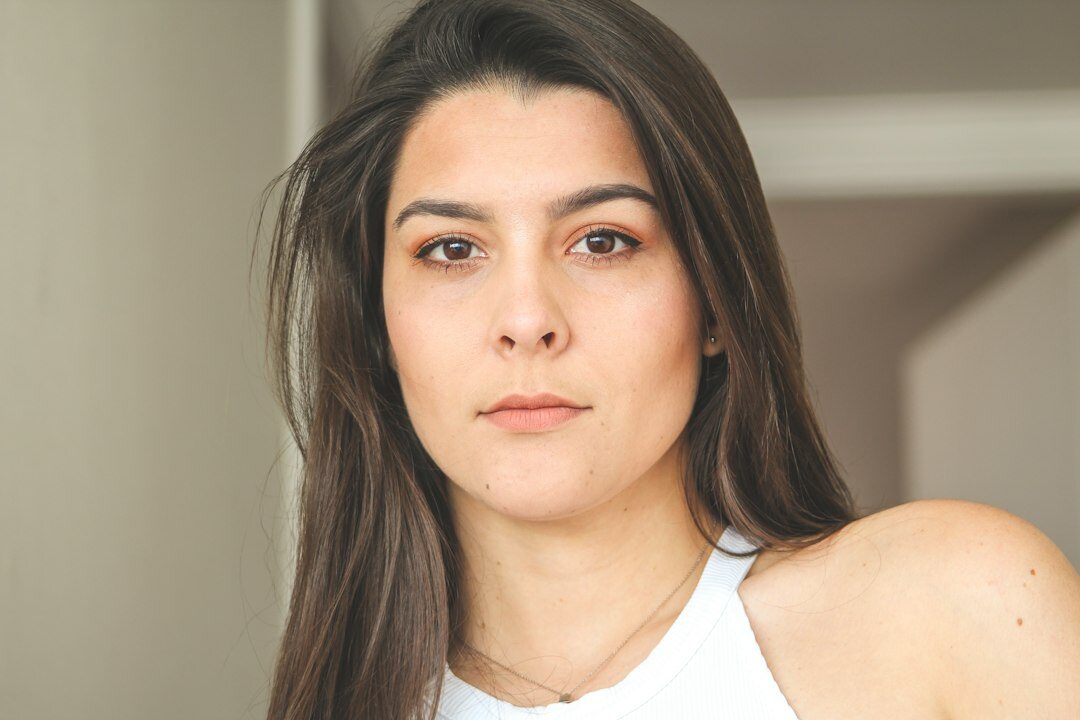 Portrait of a confident businesswoman with dark hair