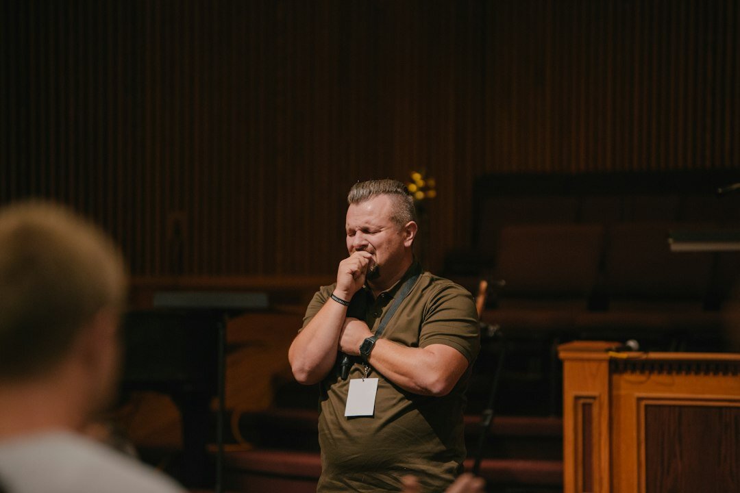 Confident businessman speaking during a leadership session